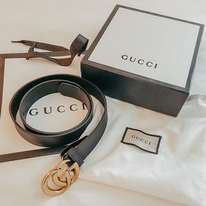 black gg GUCCI belt gold buckle